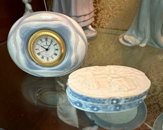 Lladro- Clock is sold.
