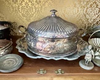 The small silver figurine on the right is sold.
