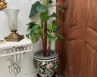 The pot and stand are sold.