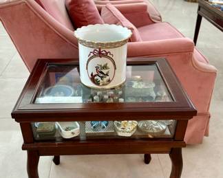 The pot on the table and table are sold.