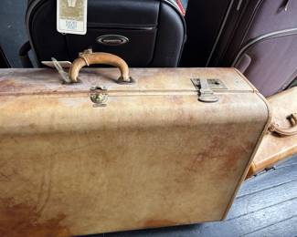 Lots of suitcases new and old