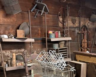 Military helmet, metal baskets, animal traps, vintage sleigh