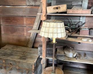 Soda crates, trunks, floor lamp 
