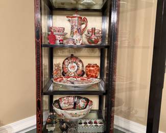 Japanned lighted display cabinet filled with Imari, Kutani, Cinnabar, Cloisonné 