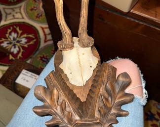 Antlers mounted on carved wood from Germany