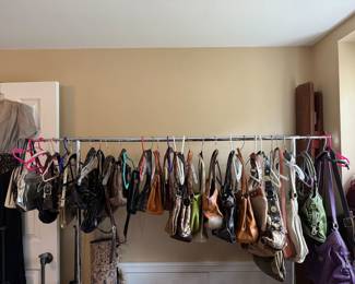 Tons of vintage and designer hand bags