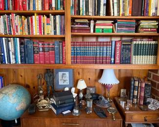Tons of books to include books on tidewater history, Virginia, Military, globes, cranberry glass lamp