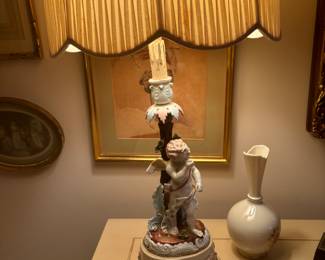 Pair of cherub lamos