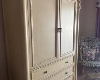Off white bedroom armoire 
Matching pieces also
