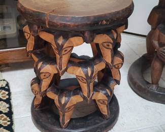 Cameroon stool with carved bat heads