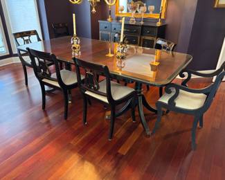 Beautiful dining table with 8 chairs (two leafs are in table now and it also has flip down ends to make it very small when collapsed)