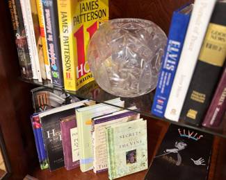 Books, crystal vase