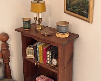 Vintage shelf, books, clock, vintage lamp, candle holders, art