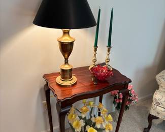 Accent table, brass lamp, candle sticks