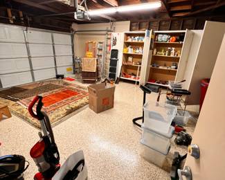 Several hand woven, vintage oriented rugs.