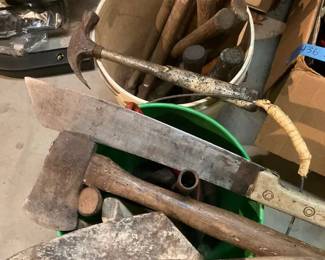 Lots of Hammers, Mallets, And Axes In Buckets