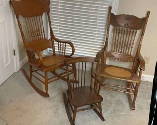 Set of Two Adult Cane Seat Rocking Chairs and One Childs Rocking Chair