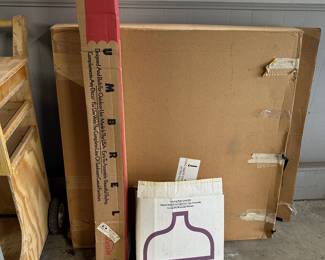 This is a three piece patio set! Round Glass top table, Umbrella and base! ALL ONE MONEY! 