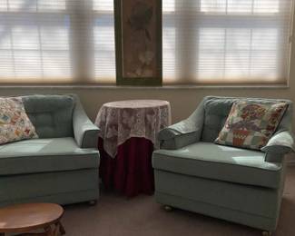 Two wheeled Green Club Chairs, Table, Stool, Print