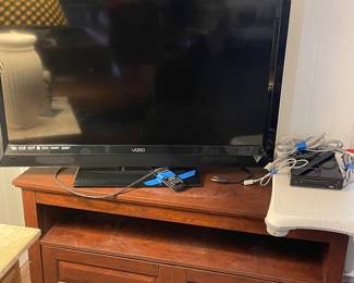 Console, Wii with games and a Vizo TV 