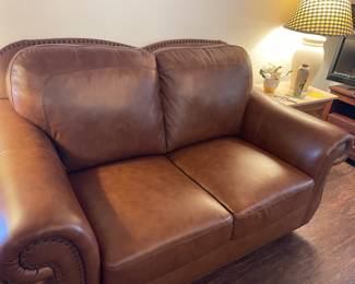 Leather Love seat in Like New Condition