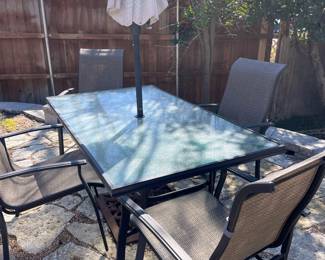Outdoor patio set with umbrella