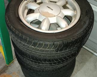 4 Primewell PS830 tires; 185-60-R14 with Mazda rims