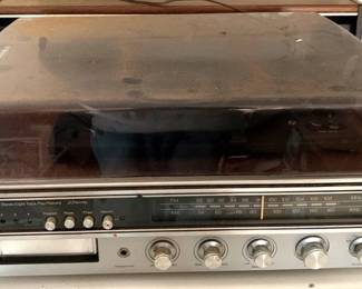 165 - AM/FM/Record Player - 5" x 16" x 20" You are buying a used as-is electric/electronic item. We do not guarantee all components are present, and if it is not expressly stated, it is untested.