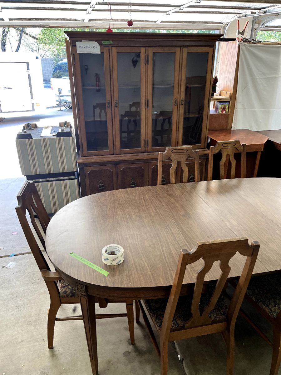 Table with six chairs and hutch