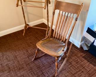 Antique rocker with cane seating; blanket stand
