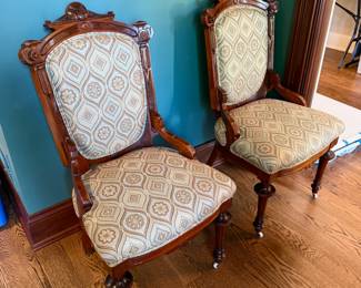 Antique upholstered chairs on casters