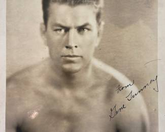 Gene Tunney autographed photo. Heavy weight boxer (1915-1928), defeated jack Dempsey for the World Champion title in 1926, and in 1927 (the 'long count' controversy). Retired undefeated. Also a marine and navy vet; served in both WWl and WWll.