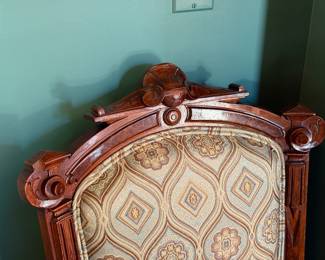 Antique upholstered chairs on casters