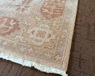 Turkish hand-knotted area rug with abstract floral and geometric motif in light warm colors (approx. 6' x 9')