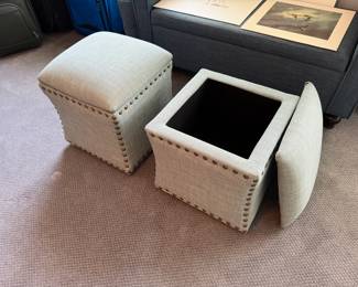 Beige upholstered studded square storage ottomans