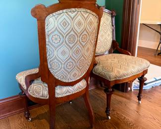 Antique upholstered chairs on casters