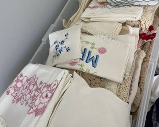 Assorted linens; some embroidered