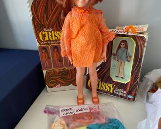 Vintage Chrissy doll with clothes and original boxes