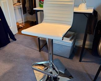 white hydraulic stool