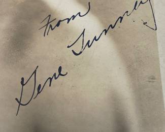 Gene Tunney autographed photo. Heavy weight boxer (1915-1928), defeated jack Dempsey for the World Champion title in 1926, and in 1927 (the 'long count' controversy). Retired undefeated. Also a marine and navy vet; served in both WWl and WWll.