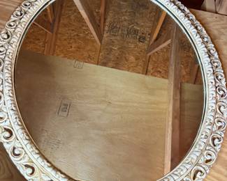 White wood framed oval mirror