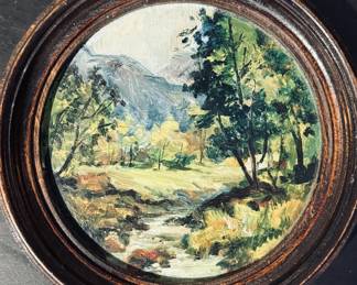 Small round framed painting signed on back