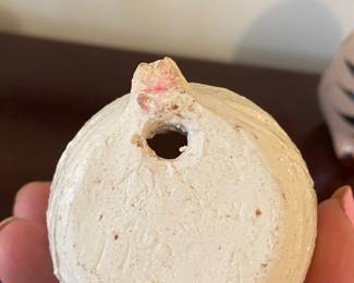 white ceramic owl with holes