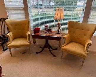 Vintage Butterfly Wingback Button Tufted Lounge Chairs (gold);  Antique mahogany flip top game/console table with metal claw feet