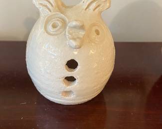 white ceramic owl with holes