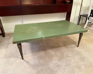 Antique painted coffee table with ornate brass legs.
