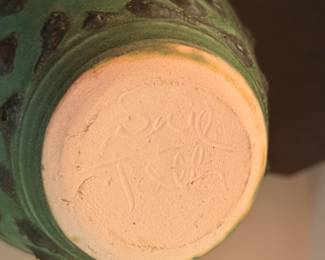 Green and Black pottery vase; signed