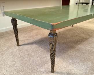 Antique painted coffee table with ornate brass legs.
