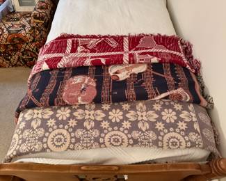 Assorted throws and bedspreads