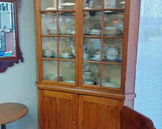 large antique walnut wood pegged corner cabinet with wavy bubble glass